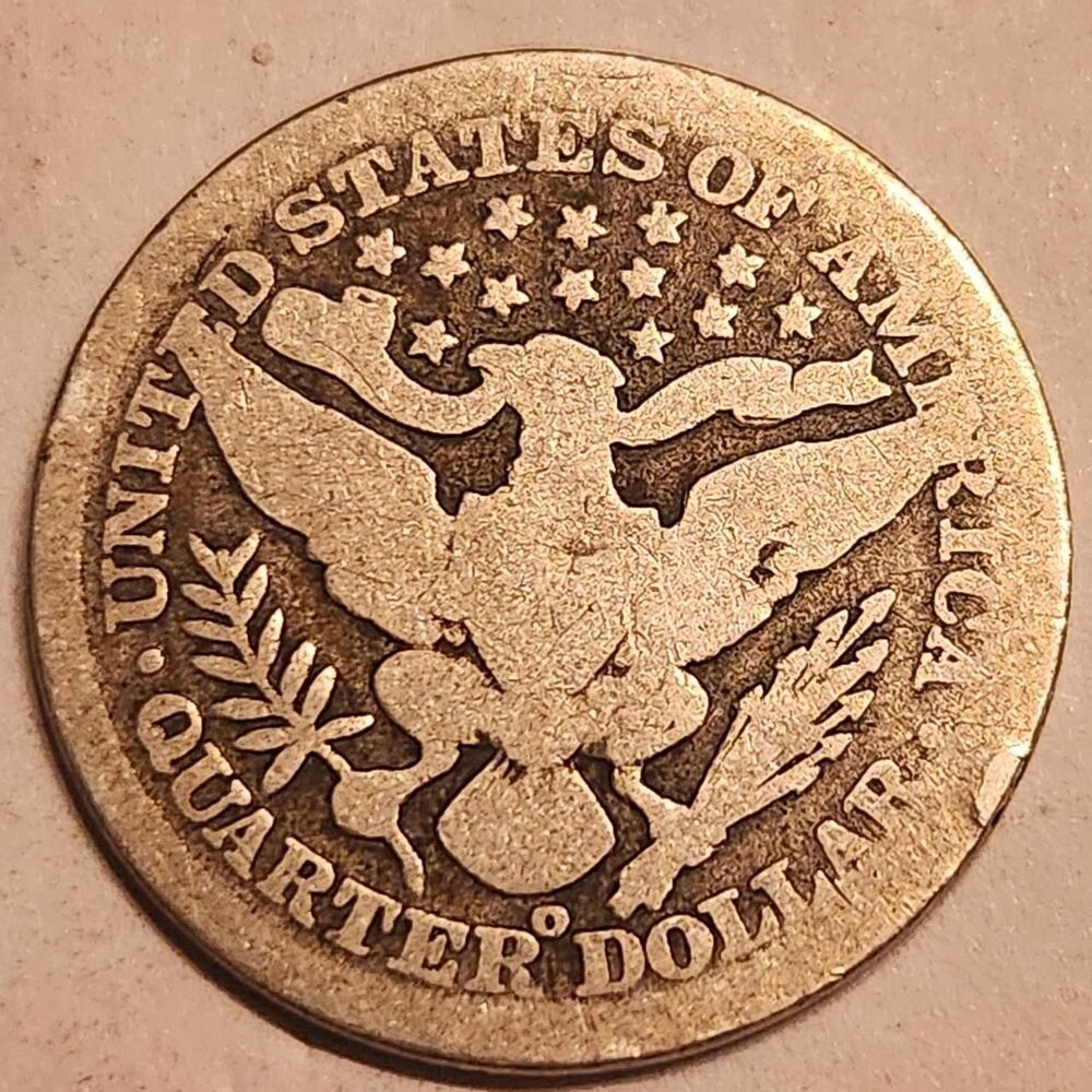 1898-O Barber Quarter Silver Coin.
The 1898-O...